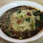 玩转重庆美食之旅：探寻糊辣壳小面的麻辣传奇