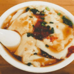 重庆小吃与甜品的味蕾盛宴：豆腐脑的千年传承与创新